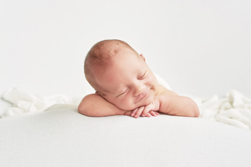 newborn boy white background